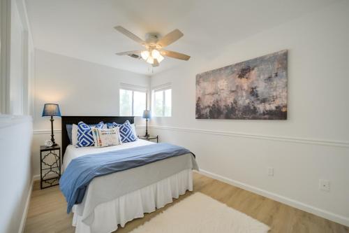 a bedroom with a bed and a ceiling fan at Lakefront Granite Shoals Escape with Dock! in Granite Shoals