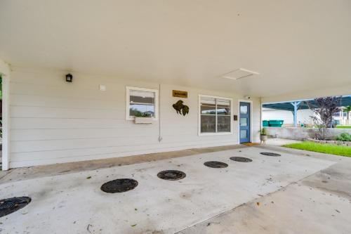 an empty garage with four burners on the floor at Lakefront Granite Shoals Escape with Dock! in Granite Shoals