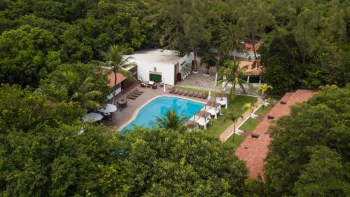 an aerial view of a house with a swimming pool at Verde Mar Pipa Beach in Pipa