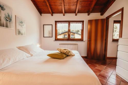 เตียงในห้องที่ Casa Torelù - Lakeside Leisure & Business