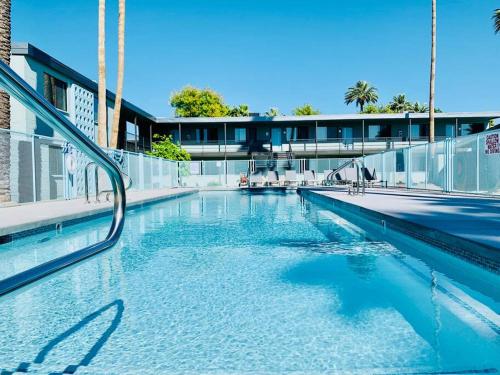 a swimming pool with blue water in a building at Hidden Gem in OT Studio with Heated Pool in Scottsdale