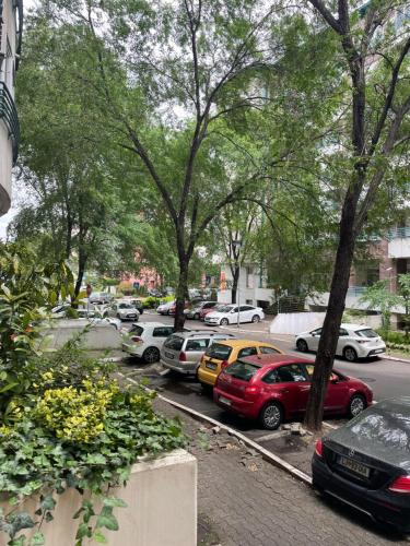 a group of cars parked in a parking lot at Belgrade with love in Novi Beograd