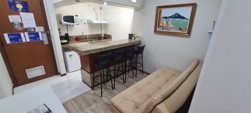 Dapur atau dapur kecil di Flat Pasárgada 812, pé na praia