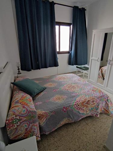 Ένα ή περισσότερα κρεβάτια σε δωμάτιο στο San Gregorio House