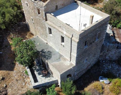 an overhead view of a stone building with a staircase at Vathia Tower 1894 in Váthia