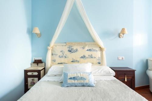 A bed or beds in a room at La Casa del Telar