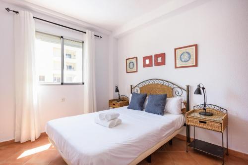 Postel nebo postele na pokoji v ubytování Stay U-nique Apartment Carlota Alessandri
