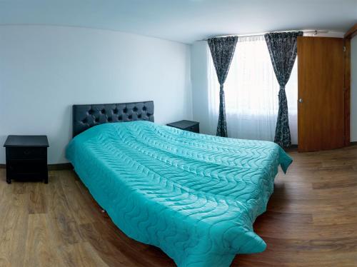 Voodi või voodid majutusasutuse Chalet Íntimo-Delpilar con zona de Jacuzzi ! toas