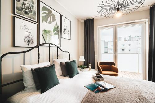 Postel nebo postele na pokoji v ubytování Pure Rental Apartments Inżynierska