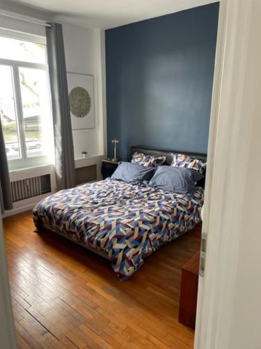 Postel nebo postele na pokoji v ubytování APPT CENTRE VILLE ROUEN