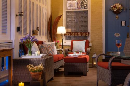 a living room with couches and chairs and a table at Inn at Woodhaven-In the Heart of the Bourbon Trail-Over 12 Distilleries Nearby in Louisville