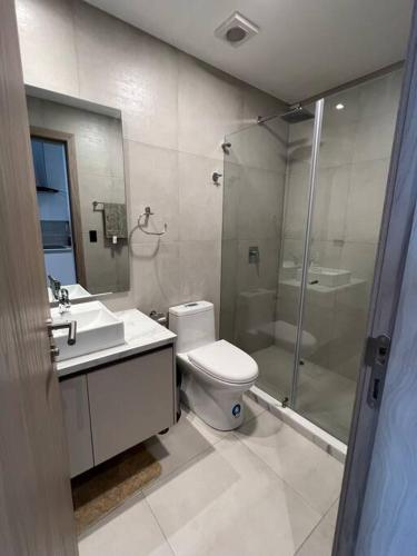 a bathroom with a shower and a toilet and a sink at Sky View Studio - Best Area Quito in Quito
