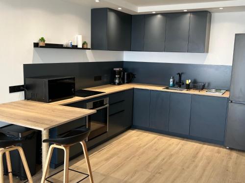 Kuchyň nebo kuchyňský kout v ubytování Studio vue mer Residence Mont Vernon