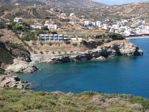 a view of a small island in the water at Diana Apartments in Agia Pelagia