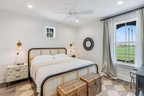 a bedroom with a bed and a window at Fairway to Heaven in Port Aransas