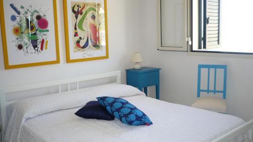 Postel nebo postele na pokoji v ubytování Casa Sul Mare con Vista Mozzafiato