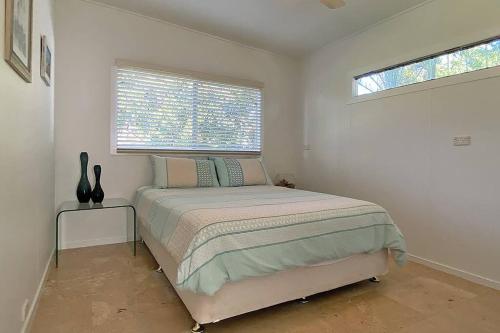 Una cama o camas en una habitación de TRUE ENDEAVOUR