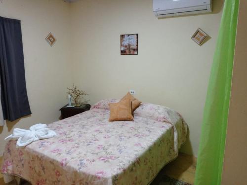 Ένα ή περισσότερα κρεβάτια σε δωμάτιο στο Alojamiento Wilkenia