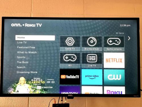 a television screen with a video game on it at Town House Motor Inn in Worland