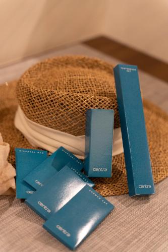 a group of blue cards sitting on top of a towel at Centara Life Hotel Bangkok Phra Nakhon in Bangkok