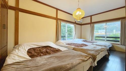 Giường trong phòng chung tại Coastlands Tateyama Building A, Building B - Vacation STAY 40896v