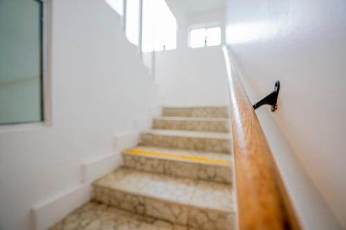 a stairway leading up to a building with a window at Beachfront Charming 1 Bdr 1 Bth in Tijuana