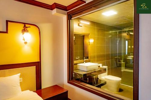 Et badeværelse på Le Chapa Hotel & Spa