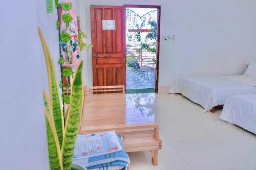 Postel nebo postele na pokoji v ubytování Homestay Châu Triều - Phan Thiết