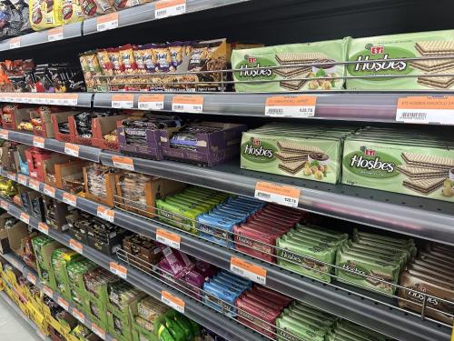 a grocery store aisle with shelves filled with food at Sophia Pool Apartments in Caesar Blue Resort, Fixed Lunch till 3pm, Gym, Swimming Pools, Sauna, Hammam, Kids' club available in Perivolia tou Trikomou