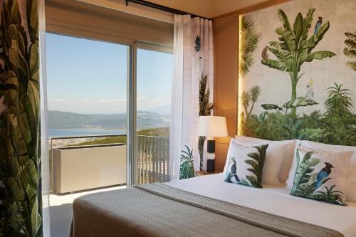 Postel nebo postele na pokoji v ubytování Epiphany Villas Lefkada