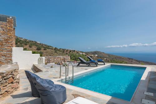 a swimming pool with a view of the ocean at Flaias Gi Villa Retreat in Agia Mavra