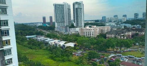 an aerial view of a city with tall buildings at Cyberjaya Shaftesbury 2 in Cyberjaya