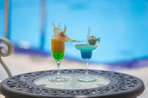 two cocktails on a tray on a table at Kassapa Lions Rock in Sigiriya
