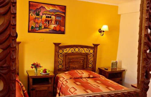 Letto o letti in una camera di Hostal Mallqui