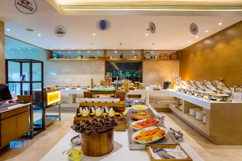 a bakery with many different types of food on display at The Fern - Goregaon in Mumbai