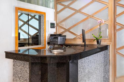 Kuchyň nebo kuchyňský kout v ubytování Hotel Andalucía