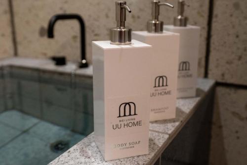 three white boxes sitting on a counter in a bathroom at UU HOME - Vacation STAY 28494v in Biei