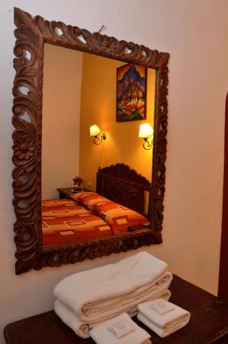 Letto o letti in una camera di Hostal Mallqui