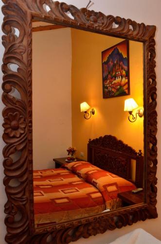 Letto o letti in una camera di Hostal Mallqui