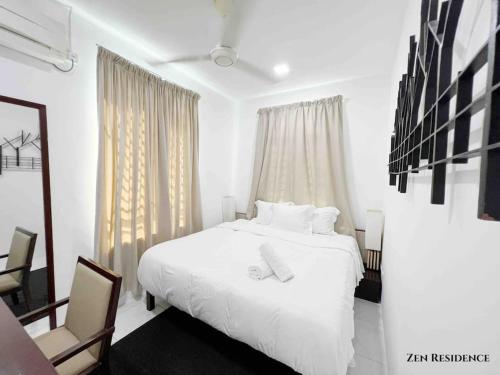 Ένα ή περισσότερα κρεβάτια σε δωμάτιο στο MINIMALIST ZEN 135 LANGKAWI- BBQ NETFLIX NINTENDO TABLE TENNIS - 4BR3B-Max 12pax