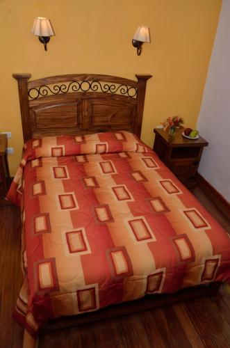Letto o letti in una camera di Hostal Mallqui