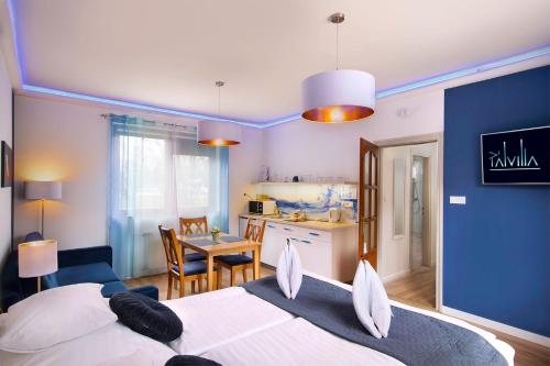 Postel nebo postele na pokoji v ubytování Pál Villa - Premium Apartments - Kecskemét