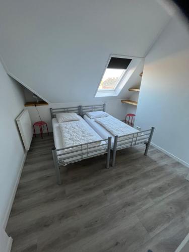 Voodi või voodid majutusasutuse Residence het Centrum toas