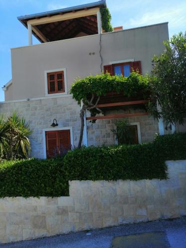 Apartment Ema in Postira