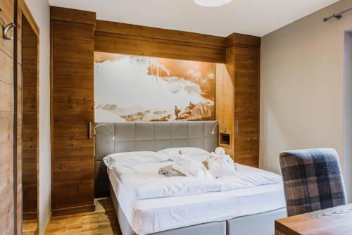 Letto o letti in una camera di Family Hotel Gran Baita