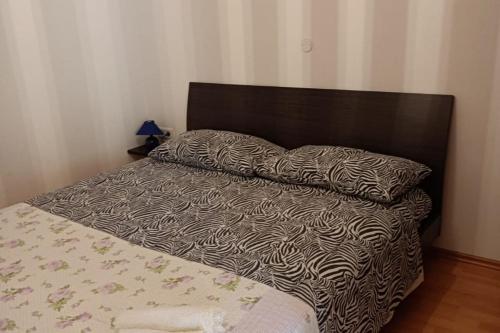 Voodi või voodid majutusasutuse Apartment Fiorita for 4 Persons Poreč close the beach toas