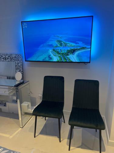 TV a/nebo společenská místnost v ubytování Madonna luxury rooms