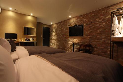 Katil atau katil-katil dalam bilik di Hotel Banwol