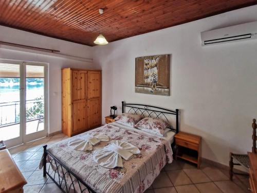 Postel nebo postele na pokoji v ubytování Villa Elena