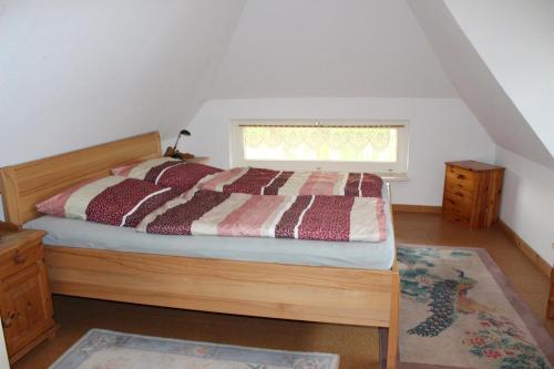 Postel nebo postele na pokoji v ubytování Ferienhaus "Am Deich 30"
